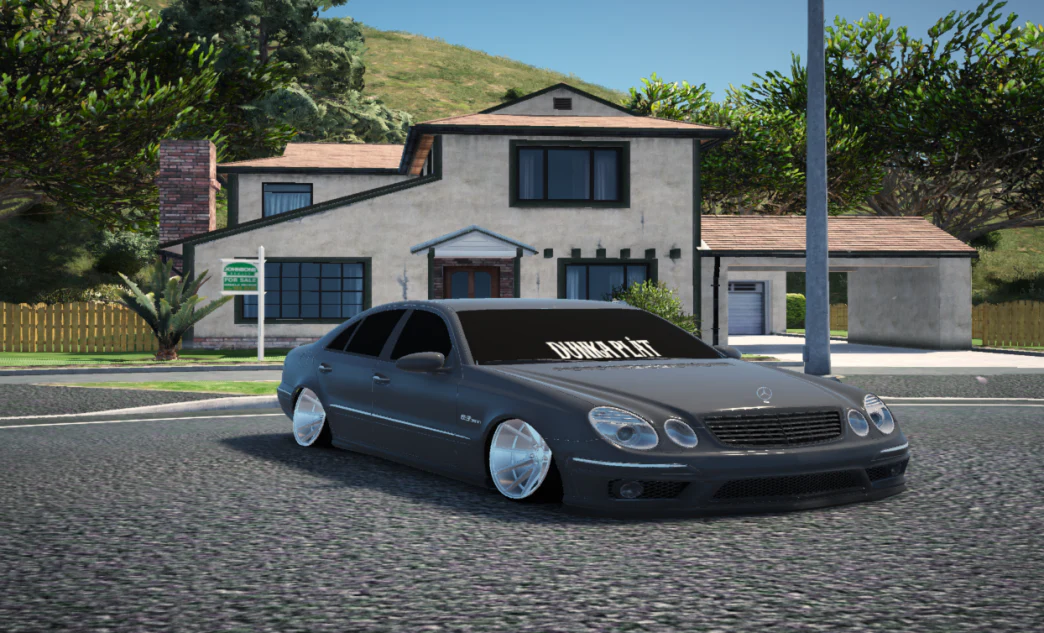 Mercedes-Benz W211 E63 AMG (DUNKAPLÅT) - Image 2